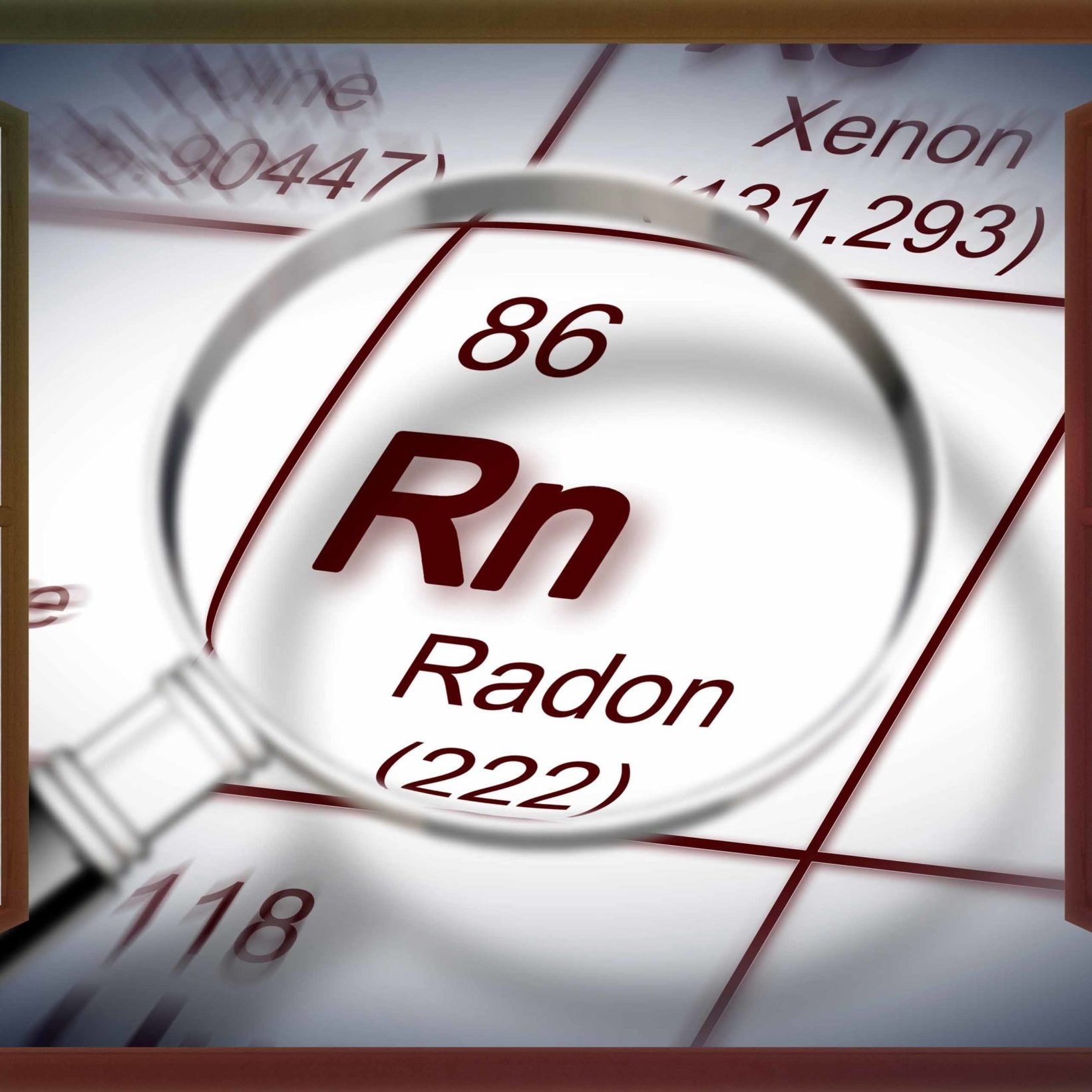 The danger of radon gas in our homes - concept image with periodic table of the elements and magnifying lens seen through a window